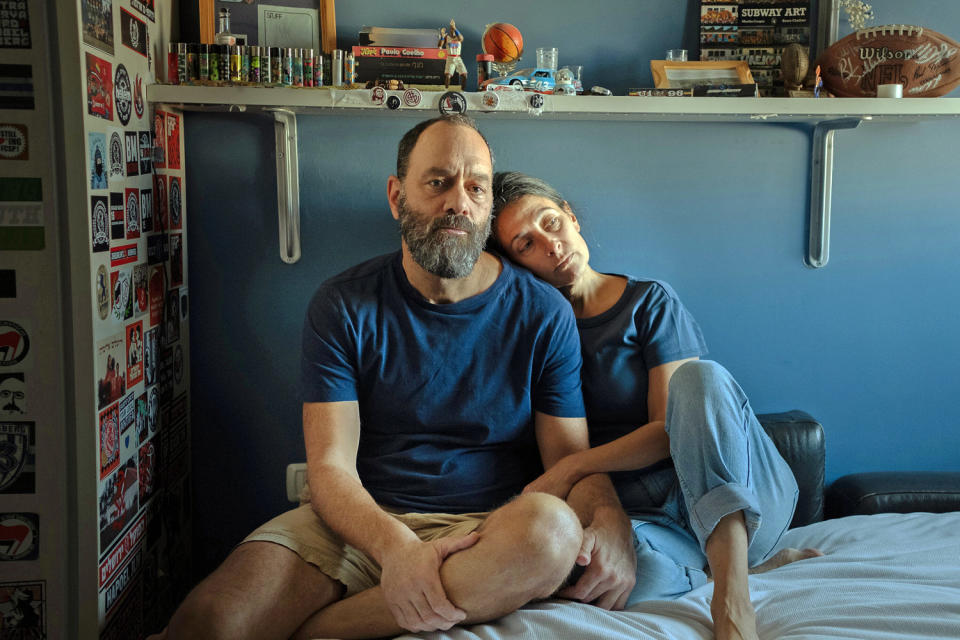 Jon Polin and Rachel  Goldberg-Polin, parents of Hersh, sit in his bedroom in Jerusalem on Oct. 26, 2023.  (Amit Elkayam / The New York Times / Redux)