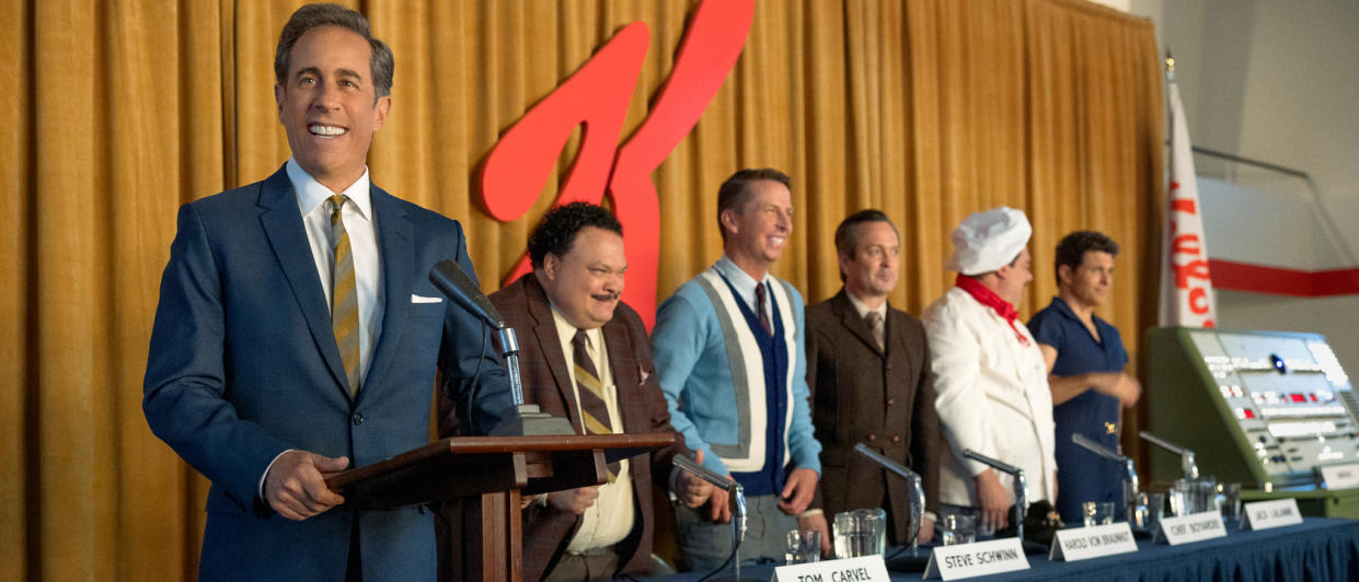  Jerry Seinfeld smiles as he presents his breakfast all-star team at a press conference in Unfrosted. 