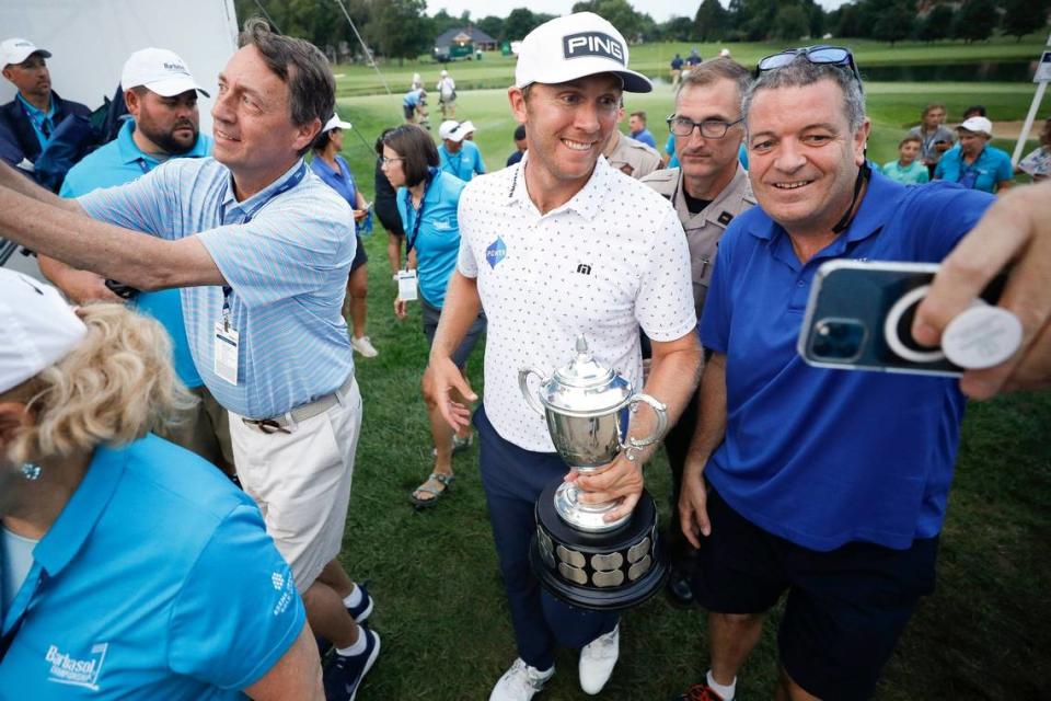 Seamus Power celebrates with fans after winning the PGA Barbasol Championship at Keene Trace Golf Club in Nicholasville, Ky., Sunday, July 18, 2021. Power defeated J.T. Poston after six playoff holes.