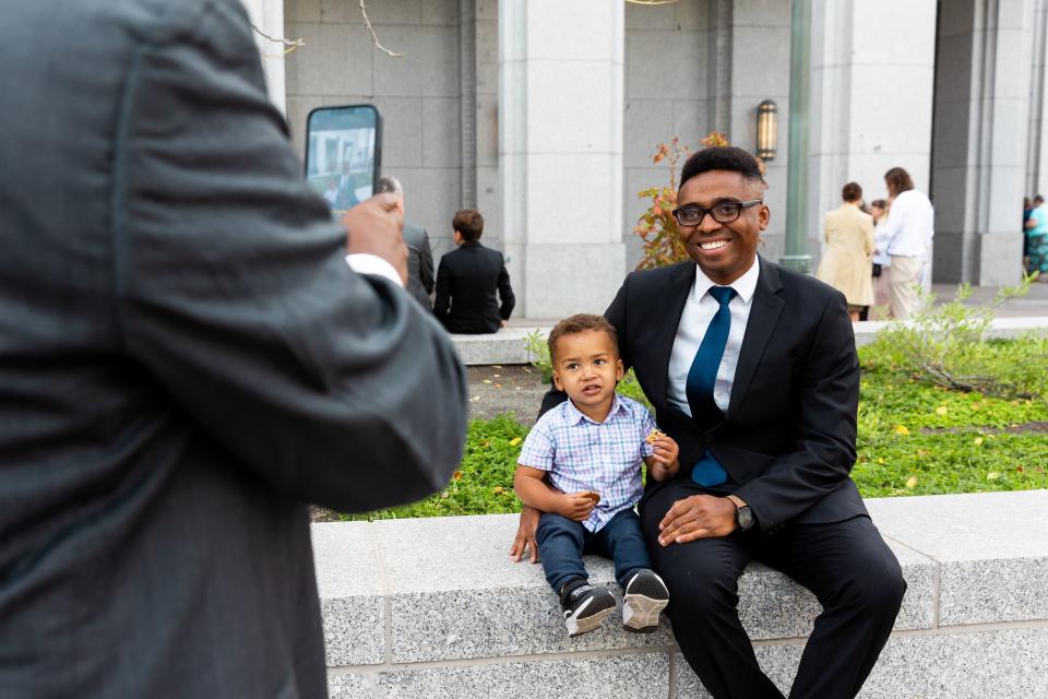 Davis Ebohon poses for a photo with his son Ikponmwosa Ebohon before the Saturday morning session of the 193rd Semiannual General Conference of The Church of Jesus Christ of Latter-day Saints at the Conference Center in Salt Lake City on Saturday, Sept. 30, 2023. | Megan Nielsen, Deseret News