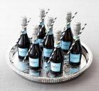 <p>Ditch the big bottles of champagne for personal mini ones. This way, people won’t have to wait in line for long and can craft their drink at their table instead. Plus, you can attach cute paper straws to them and labels if the brunch is for a wedding, baby shower, or any other celebration.</p>