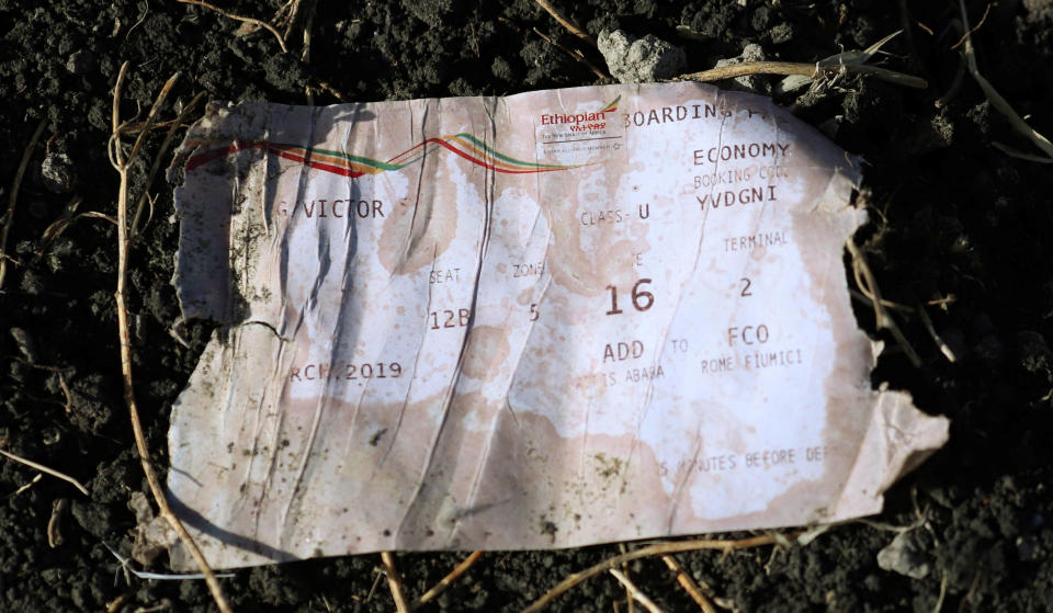 A boarding pass is seen at the scene of the Ethiopian Airlines Flight ET 302 plane crash, near the town of Bishoftu, southeast of Addis Ababa, Ethiopia March 11, 2019. (Photo: Tiksa Negeri/Reuters)