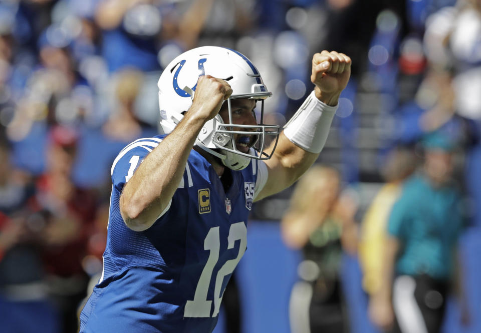 Indianapolis Colts’ Andrew Luck reacts after throwing a touchdown pass during the first half of an NFL football game against the Houston Texans, Sunday, Sept. 30, 2018, in Indianapolis. (AP Photo/Darron Cummings)