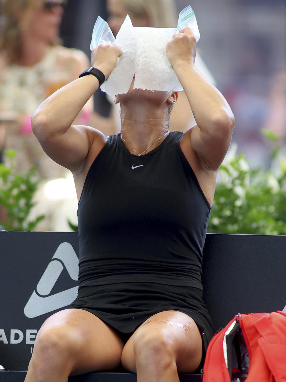 Belarus' Aryna Sabalenka cools down with bags of ice during a game break during the final of the Adelaide International Tennis tournament against Czech Republic's Linda Noskova in Adelaide, Australia, Sunday, Jan. 8, 2023. (AP Photo/Kelly Barnes)