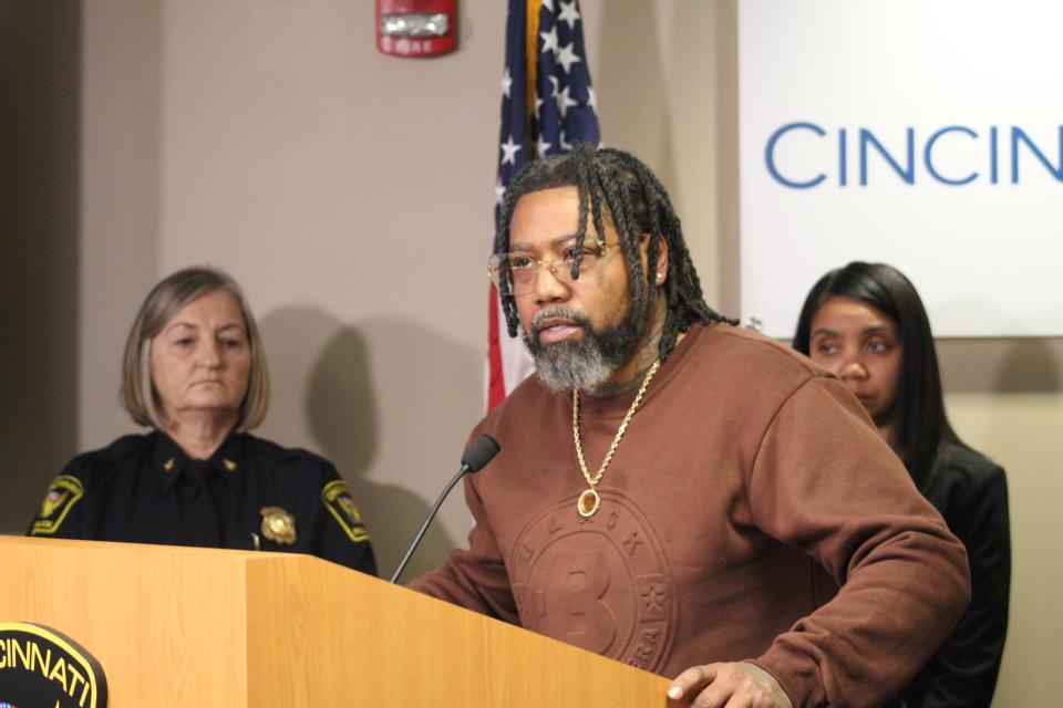 Issac Davis, the father of an 11-year-old boy killed in a West End mass shooting, speaks during a press conference on Sunday.