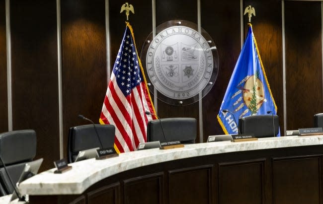 The Oklahoma County Board of County Commissioners meeting room is shown in Oklahoma City.