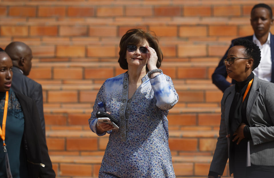 Britain's Cherie Blair, also known as Cherie Booth, arrives to lay wreaths at the Kigali Genocide Memorial in Kigali, Rwanda Sunday, April 7, 2019. Rwanda is commemorating the 25th anniversary of when the country descended into an orgy of violence in which some 800,000 Tutsis and moderate Hutus were massacred by the majority Hutu population over a 100-day period in what was the worst genocide in recent history. (AP Photo/Ben Curtis)