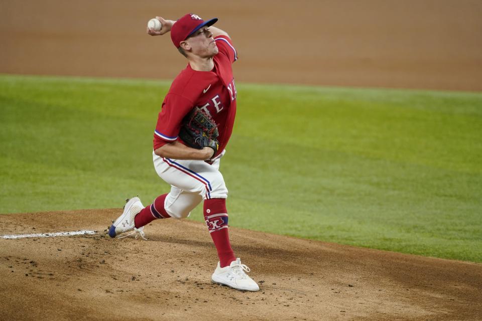 Texas Rangers starting pitcher Kolby Allard throws to a Seattle Mariners batter during the first inning of a baseball game in Arlington, Texas, Friday, July 30, 2021. (AP Photo/Tony Gutierrez)