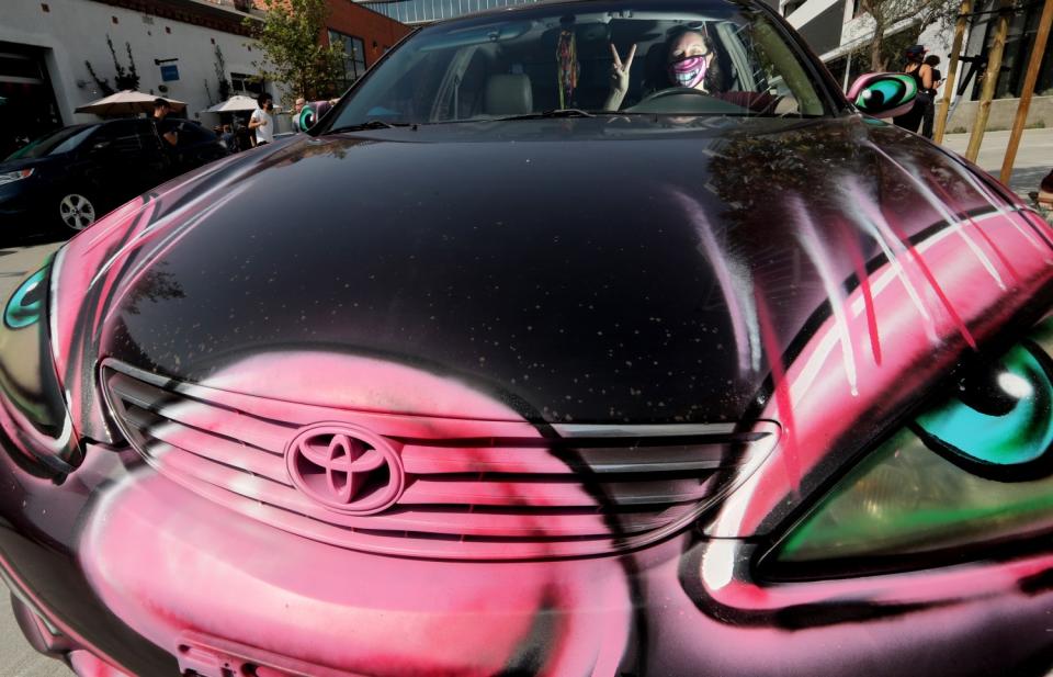 Ashly Covington in her Toyota Camry, which was given the Scharf treatment.