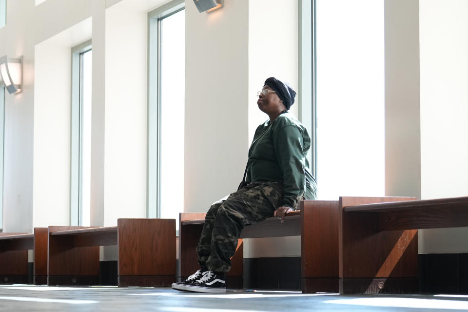 Sheneen McClain, mother of Elijah McClain, sits outside the courtroom at the Adams County Justice Center for the start of a trial of two of the police officers charged in the death of her son, Wednesday, Sept. 20, 2023, in Brighton, Colo. (AP Photo/Jack Dempsey)