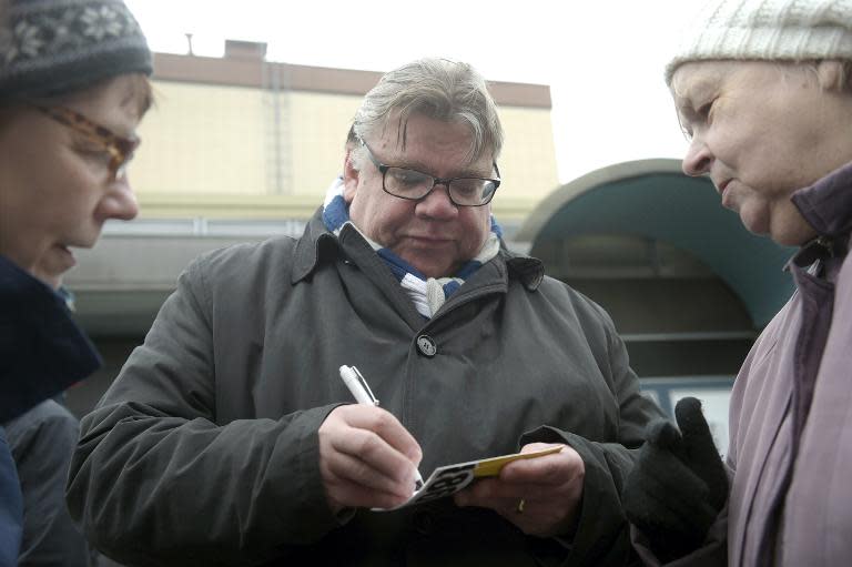 Chairman Timo Soini of the Finns Party campaigns in Vantaa, Finland on April 18, 2015, one of three parties fighting for second place in legislative elections, all hovering between 14 and 17 percent in the polls