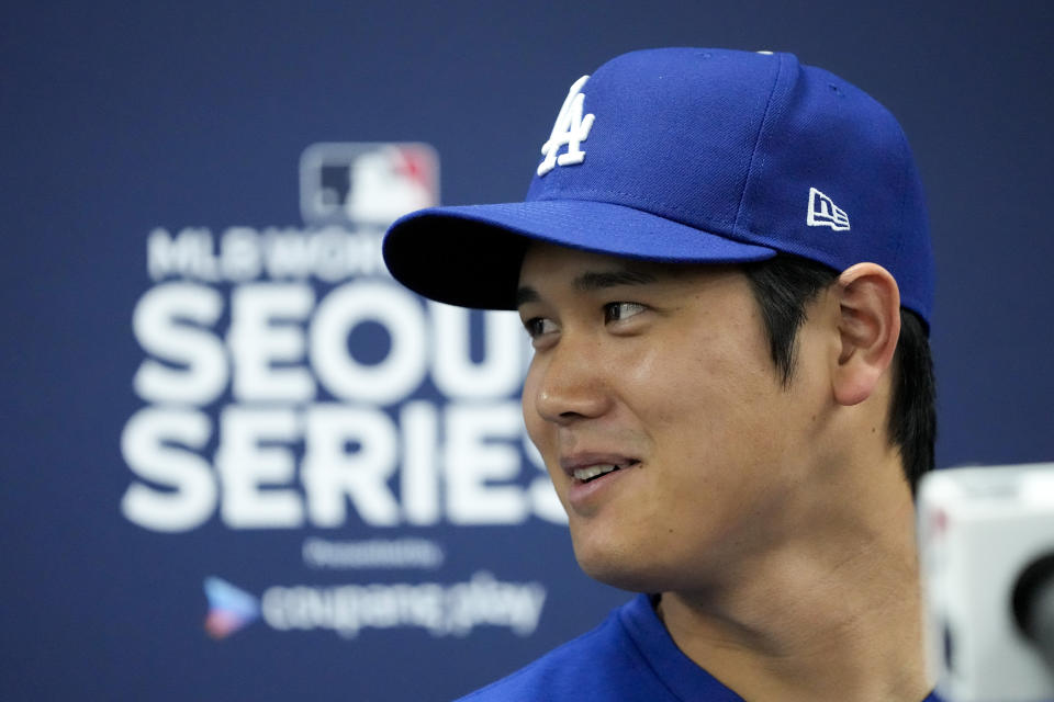 Los Angeles Dodgers' Shohei Ohtani attends a news conference ahead of a baseball workout at the Gocheok Sky Dome in Seoul, South Korea, Saturday, March 16, 2024. (AP Photo/Lee Jin-man)
