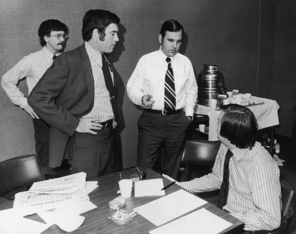 <div class="inline-image__caption"><p>Presidential assistant and Press Secretary, Ron Zeigler (C), speaks with Dan Rather (L) and other reporters in the press room of the Naval Hospital, where U.S. President Richard Nixon was admitted for pneumonia, July 13, 1973, in Washington, D.C. </p></div> <div class="inline-image__credit">Getty </div>