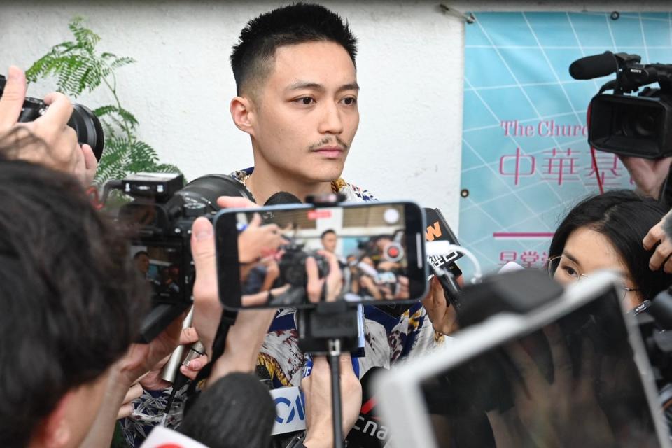 Former district councillor Shun Lee talks to the media after being found not guilty at the West Kowloon Magistrates' Court in Hong Kong (AFP via Getty Images)