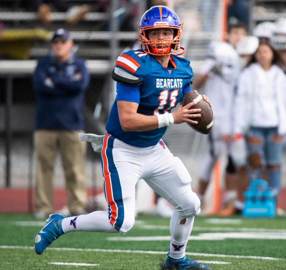 York High's Sam Stoner rolls out of the pocket as he looks to throw during a YAIAA Division I football game against Dallastown at Small Athletic Field on Saturday, Oct. 8, 2022, in York. 