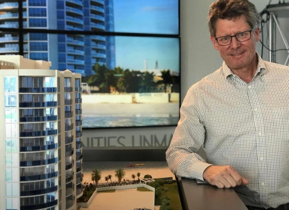 Henry Wolfond, chairman and CEO of Toronto, Canada-based Bayshore Capital, stands next to a scale model of his company's then-planned Max Daytona luxury condominium project in May 15, 2018. The 12-story project was later changed to become a 72-room luxury hotel, which opened in June 2022 as the Max Beach Resort. It is located at 1901 S. Atlantic Ave. in Daytona Beach Shores.