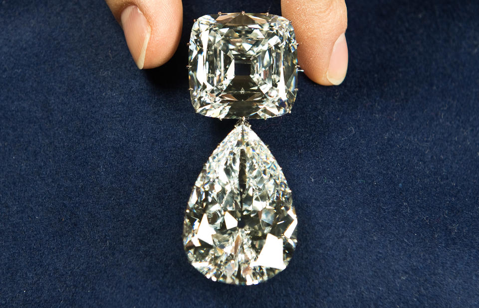 LONDON - MAY 15:  The Cullinan III and IV Brooch is displayed ahead of the 'Diamonds: A Jubilee Celebration' exhibition at Buckingham Palace on May 15, 2012 in London, England. The jewellery is made from the Cullinan Diamond, the largest diamond ever found. (Photo by Samir Hussein/WireImage)