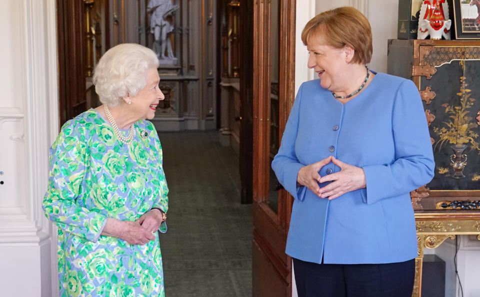 WINDSOR, ENGLAND - JULY 2: Queen Elizabeth II receives the Chancellor of Germany, Angela Merkel, during an audience at Windsor Castle on July 2, 2021 in Windsor, England. Angela Merkel is in her final few months as German Chancellor announcing in 2018 that she would not seek a fifth term in September's elections.  (Photo by Steve Parsons- WPA Pool/Getty Images)