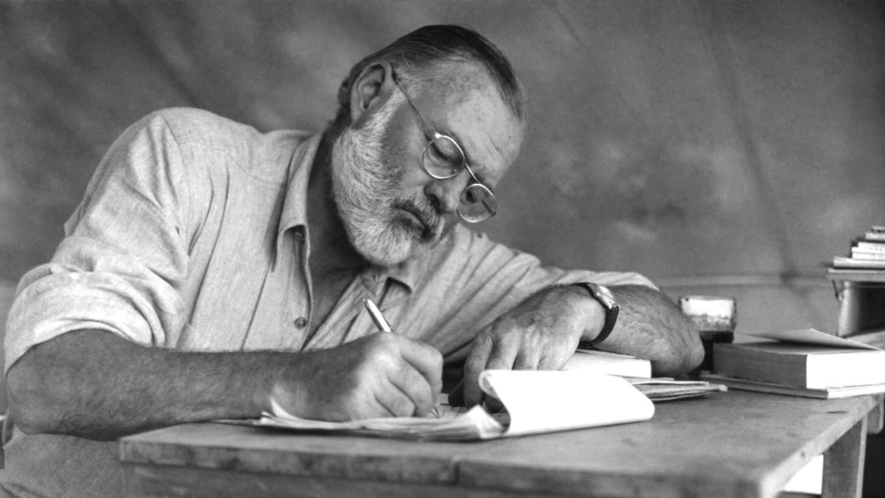 american writer ernest hemingway 1899 1961 working at a portable table while on a big game hunt in kenya, september 1952 photo by earl theisengetty images 