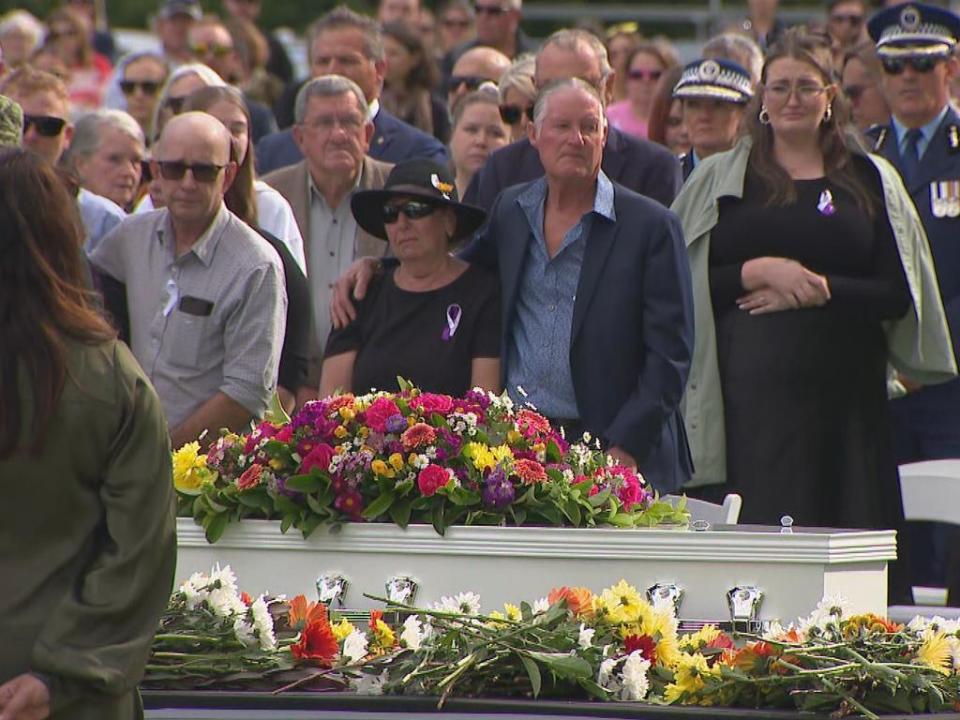 An estimated 2000 people gathered at the rugby field in Forbes to farewell the 28-year-old mother. Picture: 9News