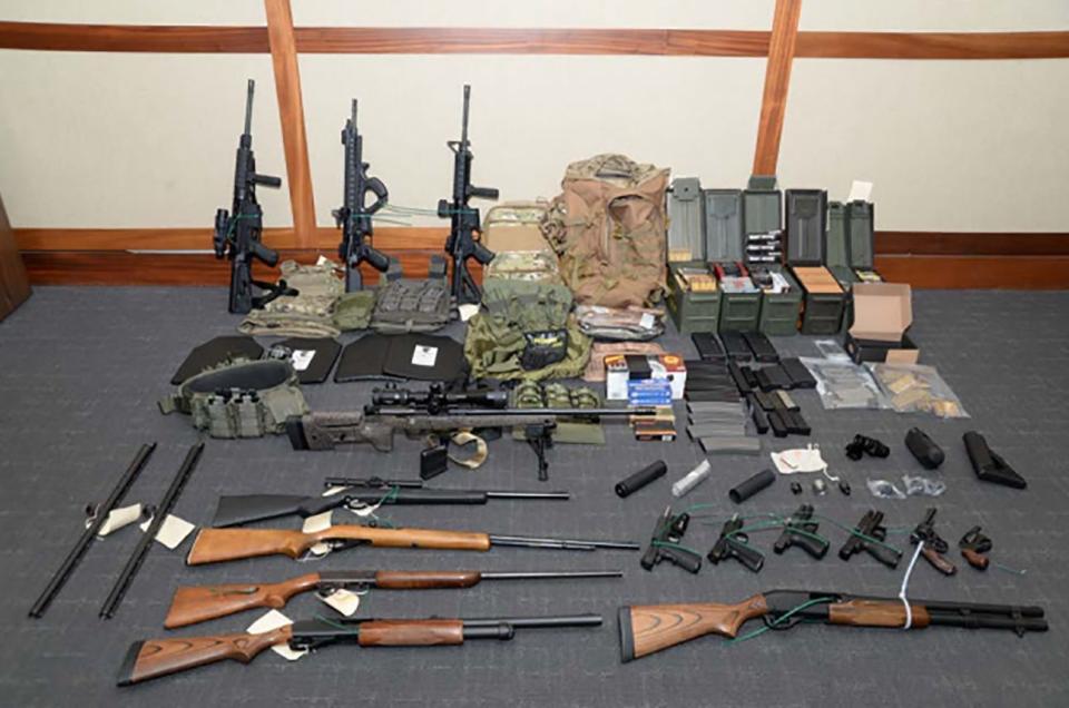 Weapons seized at the Silver Spring, Maryland, home of US Coast Guard officer Christopher Paul Hasson. He espoused white supremacist views and drafted a target list of Democratic politicians and prominent media figures and was arrested on firearms and drug charges on Feb. 15, 2019.