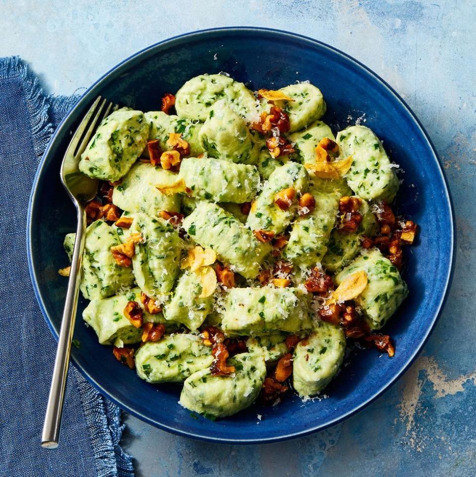 <p>Don't make just any old pasta dish for New Year's Eve — try your hand at fluffy spinach-ricotta gnocchi (it's easier than you think!).</p><p>Get the <a href="https://www.goodhousekeeping.com/food-recipes/a34285759/ricotta-gnocchi-with-toasted-garlic-and-walnuts-recipe/" rel="nofollow noopener" target="_blank" data-ylk="slk:Ricotta Gnocchi with Toasted Garlic & Walnuts recipe" class="link "><strong>Ricotta Gnocchi with Toasted Garlic & Walnuts recipe</strong></a><em>.</em></p>