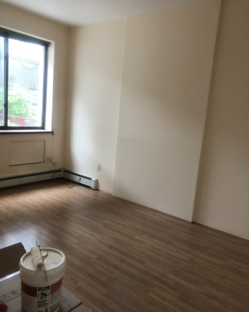 Empty bedroom with beige walls before decorating