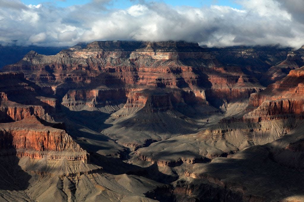 Clouds cast shadows along the Grand Canyon's South Rim in this file photo from Feb. 13, 2017. (Photo by RHONA WISE / AFP) (Photo by RHONA WISE/AFP via Getty Images)
