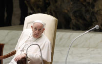 Pope Francis attends his weekly general audience in the Paul VI hall at the Vatican, Wednesday, Aug. 4, 2021. It was Francis' first general audience since undergoing planned surgery to remove half his colon for a severe narrowing of his large intestine on July 4, his first major surgery since he became pope in 2013. (AP Photo/Riccardo De Luca)