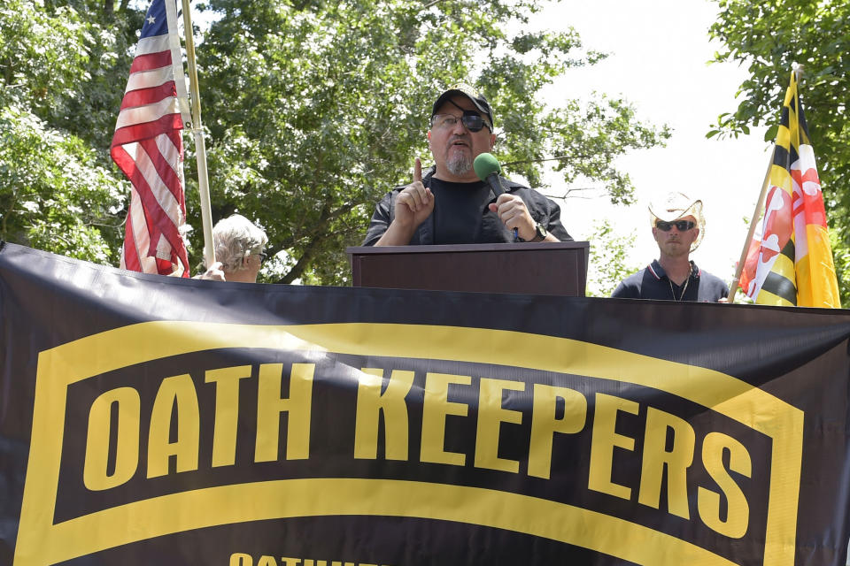 FILE - Stewart Rhodes, founder of the Oath Keepers, center, speaks during a rally outside the White House in Washington, June 25, 2017. Federal prosecutors are preparing to lay out their case against the founder of the Oath Keepers’ extremist group and four associates. They are charged in the most serious case to reach trial yet in the Jan. 6, 2021, U.S. Capitol attack. Opening statements are expected Monday in Washington’s federal court in the trial of Stewart Rhodes and others charged with seditious conspiracy. (AP Photo/Susan Walsh, File)