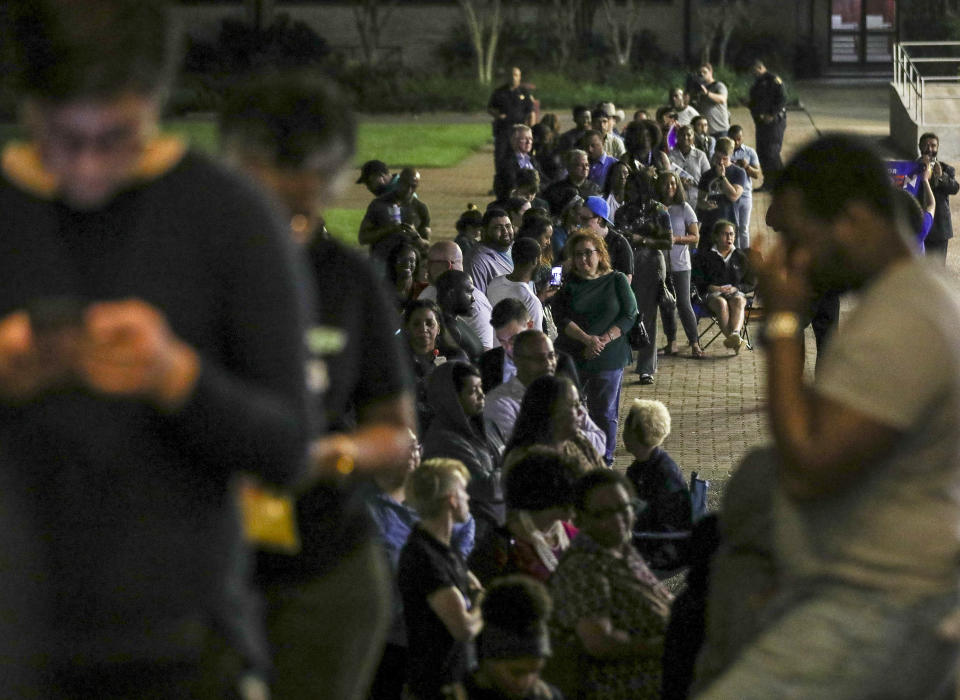 People wait in line to vote Tuesday, March 3, 2020, at Texas Southern University in Houston. As Joe Biden and Bernie Sanders racked up victories around the other 13 states holding primaries Tuesday, Texas remained a tight race hours after polls closed. (Jon Shapley/Houston Chronicle via AP)