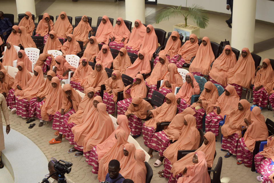 The freed students of the LEA Primary and Secondary School Kuriga upon their arrival at the state government house in Kaduna, Nigeria, Monday, March 25, 2024. More than 130 Nigerian schoolchildren rescued after more than two weeks in captivity have arrived in their home state in northwestern Nigeria ahead of their anticipated reunions with families. (AP Photo/Habila Darofai)