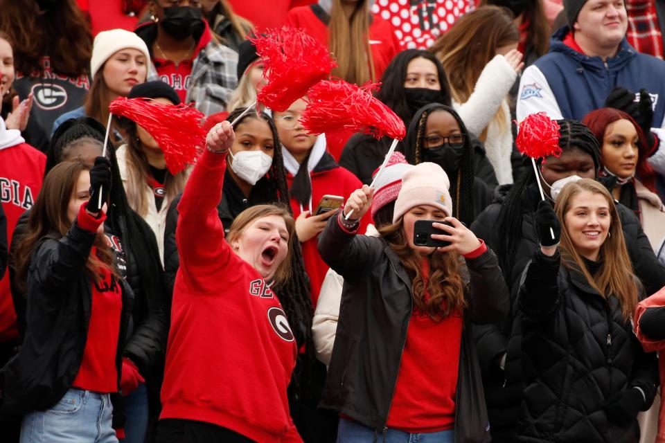 Georgia fans celebrate during the national championship celebration at Sanford Stadium in Athens, Ga., on Saturday.