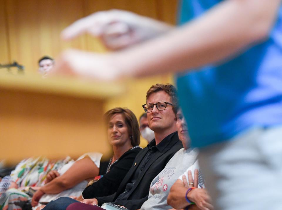 Nathan Brown, cofounder of the Upstate LGBTQ Chamber of Commerce, listens to a speaker at the Greenville County Council citizen comment session in Greenville, SC, Thursday, September 22, 2022. (Photo: Ken Ruinard / staff)