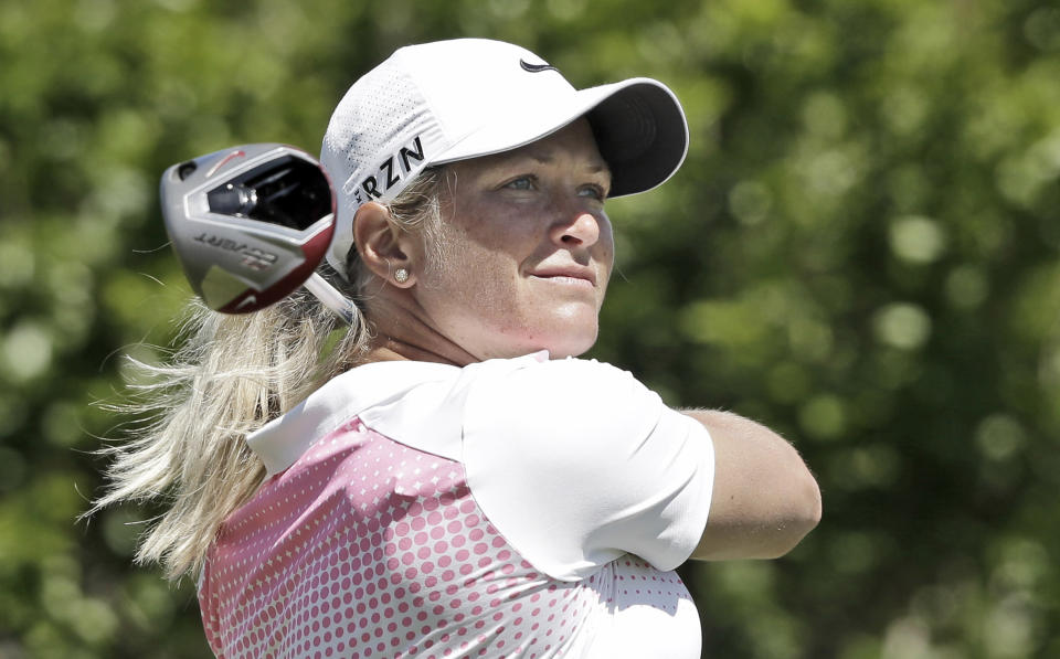 Suzann Petterson, of Norway, watchers her tee shot on the second hole during the third round of the North Texas LPGA Shootout golf tournament at the Las Colinas Country Club in Irving, Texas, Saturday, May 3, 2014. (AP Photo/LM Otero)