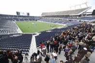 FILE - In this Nov. 19, 2014, file photo, city officials and guests get a preview of the new Citrus Bowl stadium, also known as Camping World Stadium, in Orlando, Fla. There are 23 venues bidding to host soccer matches at the 2026 World Cup in the United States, Mexico and Canada. (AP Photo/John Raoux, File)