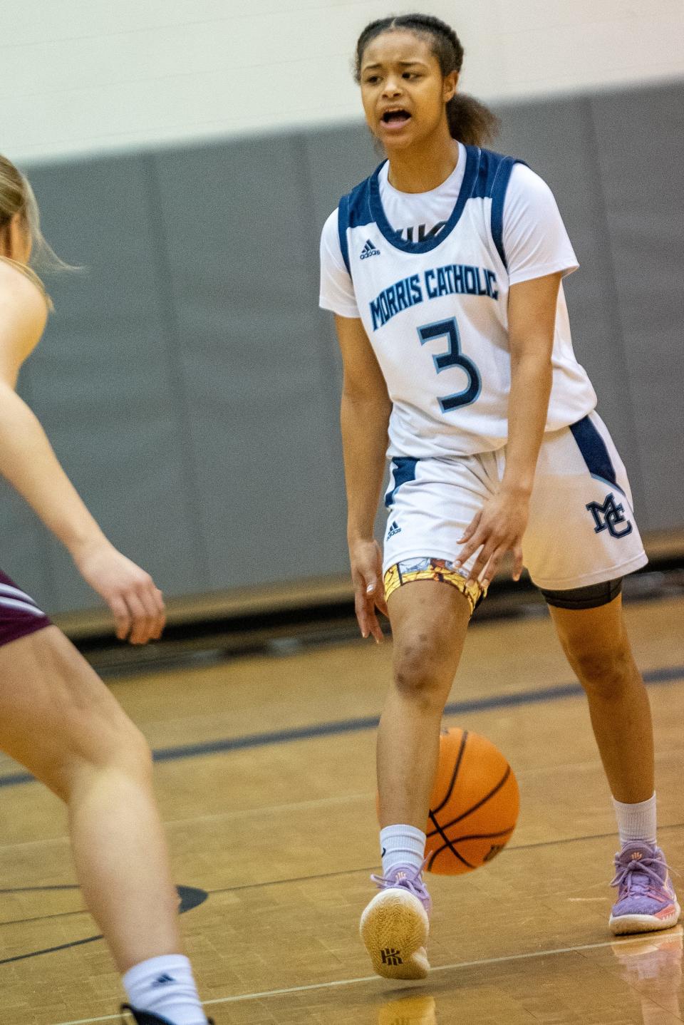 Morris Catholic plays Morristown in the final for the Morris County Basketball Tournament at County College of Morris on Friday February 25, 2022. MC #3 Mia Pauldo with the ball. 