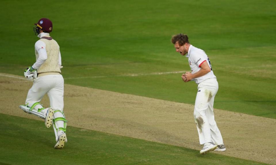 Sam Cook of Essex celebrates the wicket of Eddie Byrom.