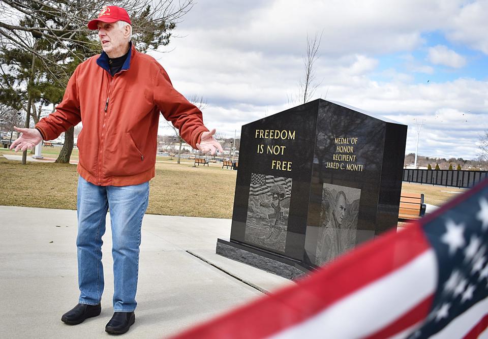 Bruce Aldrich, Commandant with the Marine Corps, at the War on Terror monument at Bicentennial Park.