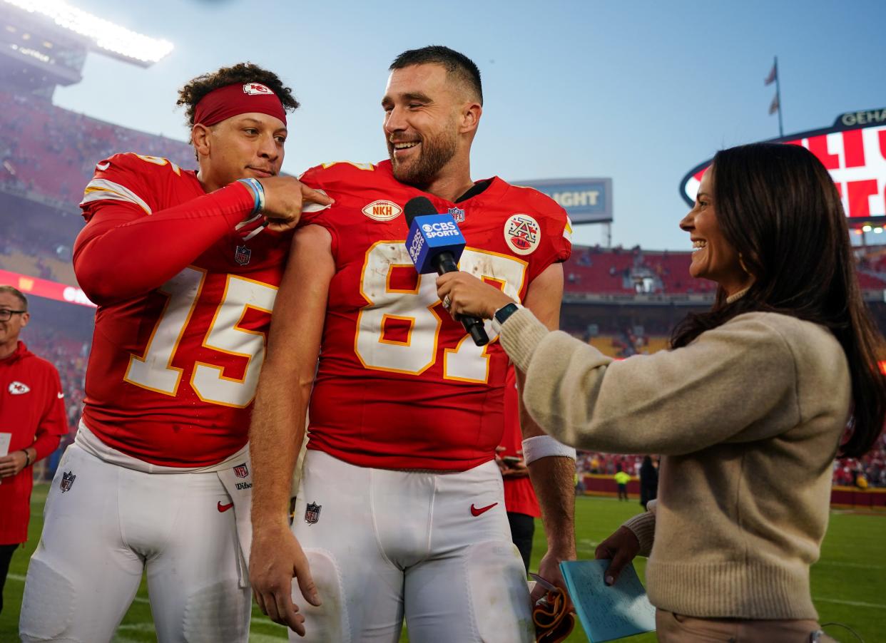 Kansas City Chiefs quarterback Patrick Mahomes and tight end Travis Kelce talk with reporter Tracy Wolfson after defeating the Los Angeles Chargers at GEHA Field at Arrowhead Stadium.