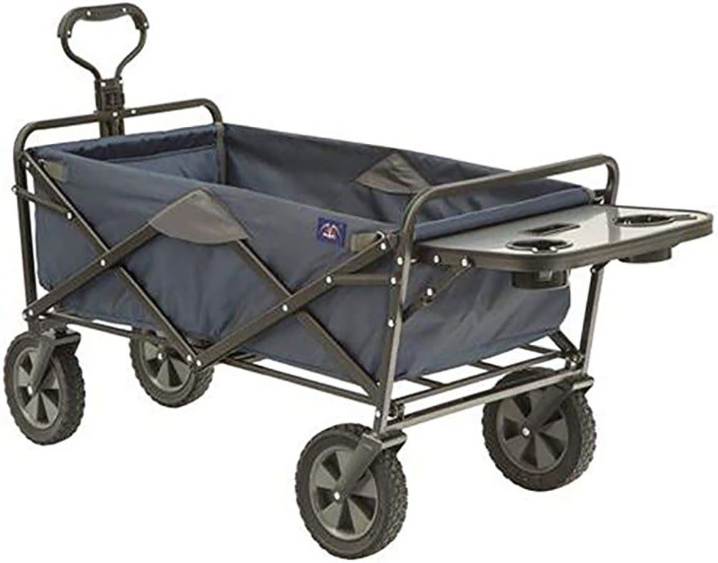 Collapsible Utility Wagon with folding table and drinks holder.