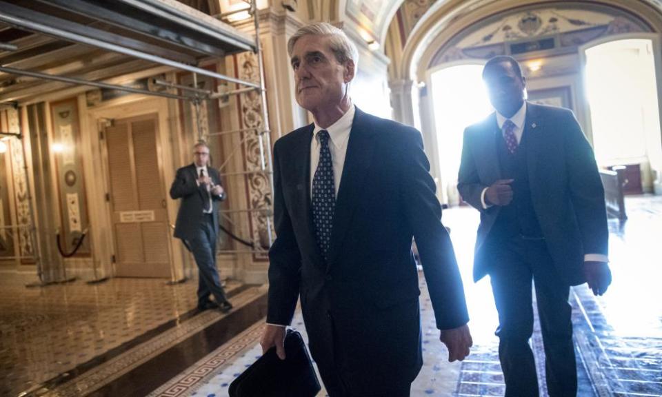 Robert Mueller leaves a meeting with members of the Senate judiciary committee, last June.