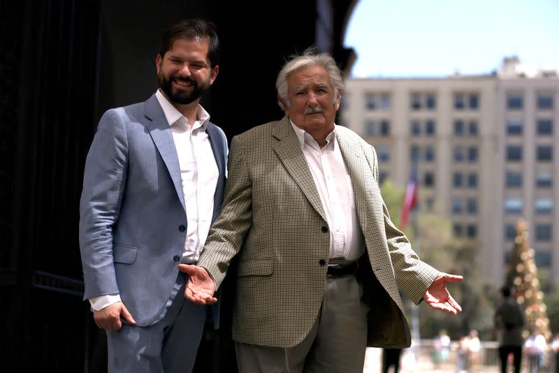 FILE PHOTO: Chile's President Gabriel Boric and former President of Uruguay Jose Mujica meet in Santiago