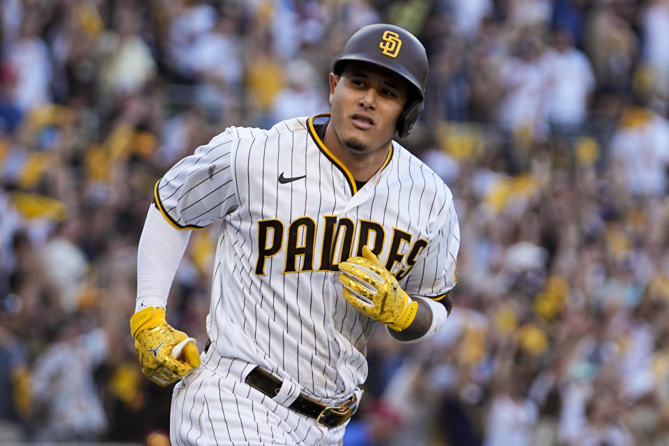 San Diego Padres' Manny Machado celebrates his home run during the seventh inning in Game 2 of the baseball NL Championship Series between the San Diego Padres and the Philadelphia Phillies on Wednesday, Oct. 19, 2022, in San Diego. (AP Photo/Brynn Anderson)