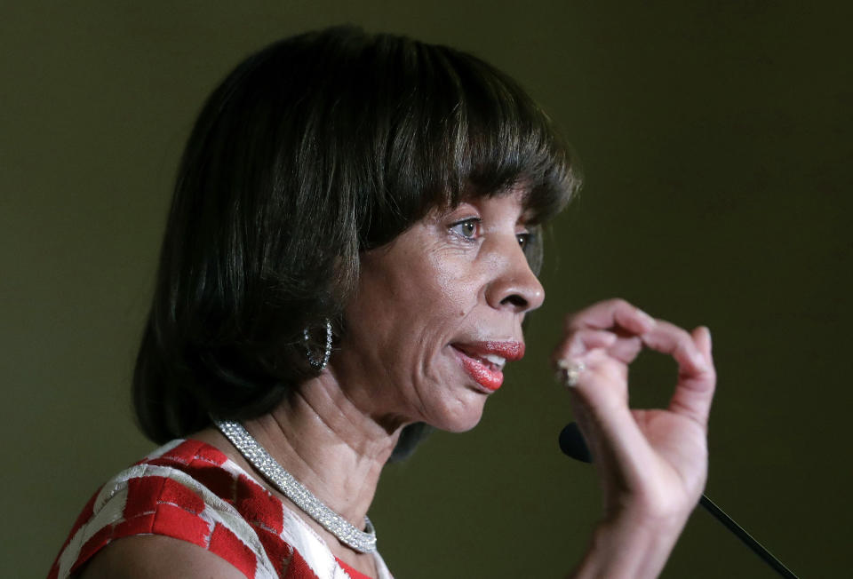 FILE - In this Dec. 6, 2016 file photo, Baltimore Mayor Catherine Pugh delivers an address during her inauguration ceremony inside the War Memorial Building in Baltimore. The disgraced former mayor of Baltimore was charged Wednesday, Nov. 20, 2019, with fraud and tax evasion involving sales of her self-published children's books. An 11-count federal indictment accuses Pugh of using her “Healthy Holly” children’s books to enrich herself, promote her political career and fund her run for mayor. (AP Photo/Patrick Semansky, File)