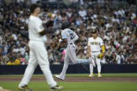 Miami Marlins' Jorge Soler rounds the bases after hitting a home run during the third inning of a baseball game against the San Diego Padres, Tuesday, Aug. 22, 2023, in San Diego. (AP Photo/Gregory Bull)