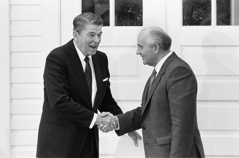 FILE PHOTO: U.S. President Ronald Reagan and Soviet President Mikhail Gorbachev shake hands after their mini-summit meeting in Reykjavik