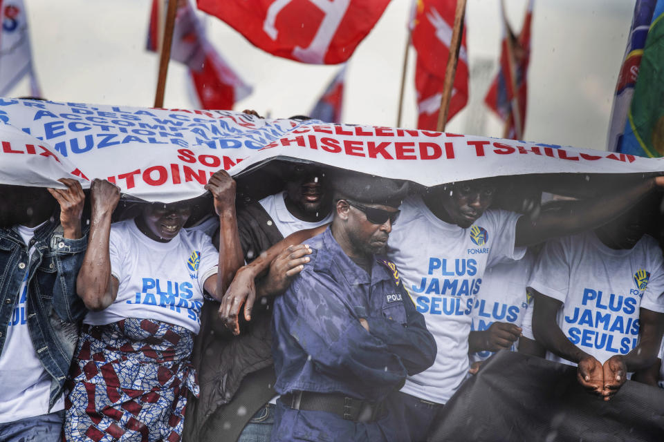 FILE - Supporters wait for the arrival of Democratic Republic of the Congo President Felix Tshisekedi at a rally in Goma, Eastern Congo, on Dec. 10, 2023. Tshisekedi is seeking reelection in Dec. 20 elections. (AP Photo/Moses Sawasawa, File)