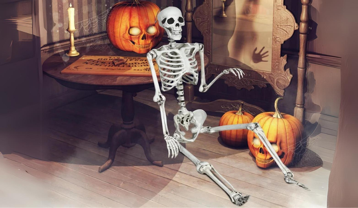 posable skeleton prop in a spookily-decorated room