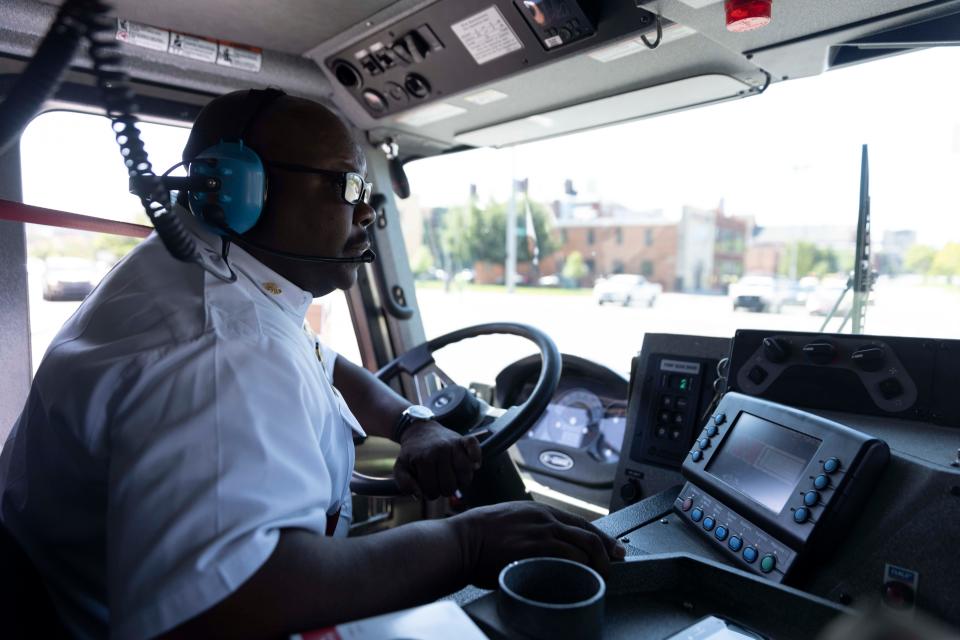 In this Enquirer file photo, Cincinnati Fire Chief Michael Washington responds to a call in the West End with Cincinnati Engine 5 firefighters.